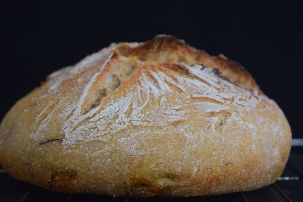 Sourdough loaf with tomatoes and thyme